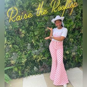 Pink and white checked bell bottom pants from fashion nova.